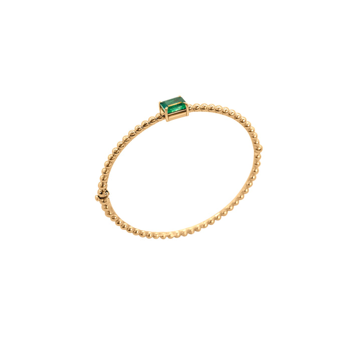 Caviar bracelet with emerald